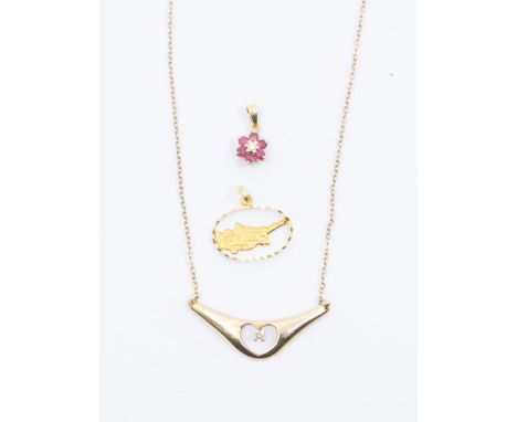 A 18ct gold Greek pendant, weight approx 0.3gms a diamond set 9ct gold necklace with pierced heart set with small diamond and