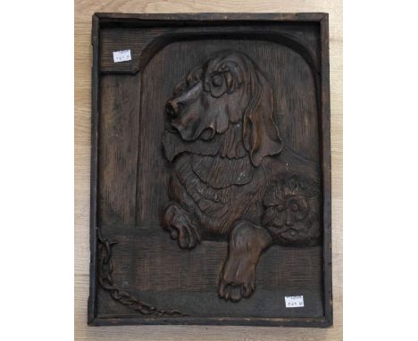 Decorative late 19th Century door panel, with dogs carved