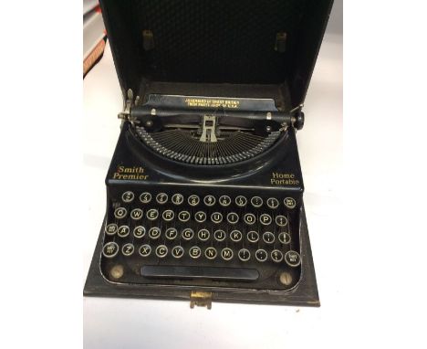 19th Century writing box with brass fittings, pair of dog book ends and two wooden boxes along with a vintage typewriter in c