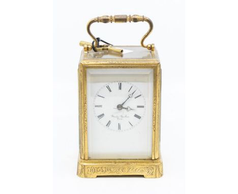 French carriage clock in gilded cast case, name on dial, Baschel Boullier, Paris, serial number 3544 on balance escapement, b