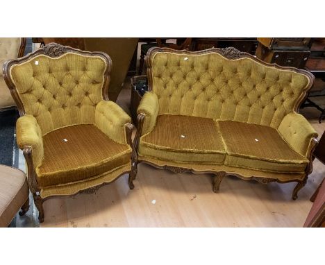 A reproduction Louis XV style French two-seater sofa and single chair, having a mahogany body with button-back mustard ground