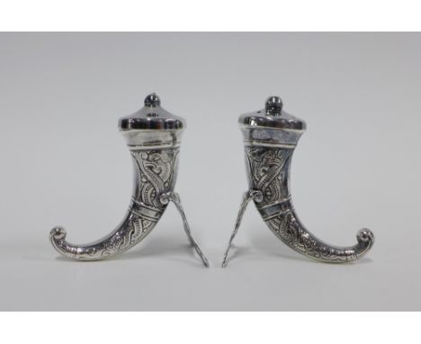 Norwegian Sterling silver salt and pepper pots, each  of cornucopia shape with engraved celtic pattern, stamped Norway Sterli