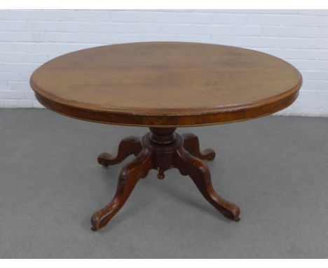 Mahogany tilt top breakfast table, oval top on baluster column with quadruple legs, terminating on ceramic castors (a/f) 117 