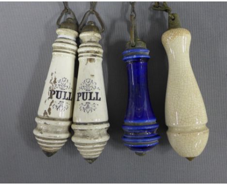 Four late 19th / early century ceramic 'Pull' handles on chains (4)