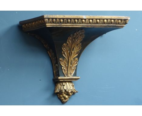 Victorian ebonised and giltwood wall bracket, carved with oak leaves and acanthus with a beaded border, W33cm, H29cm, D20cm