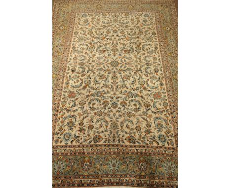 Persian Tabriz cream ground rug carpet, field with stylized floral interlaced design within multiple borders, 370cm x 236cm  