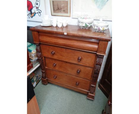 Victorian Mahogany Scotch Chest of 4 drawers with carved applied bracket sides supported on bun feet