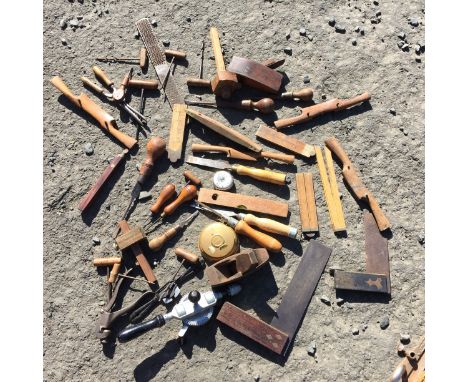 A selection of hand tools including Marpels