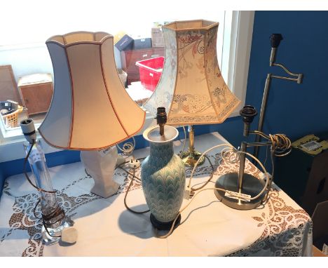 * A selection of five table lamps and a standard lamp.