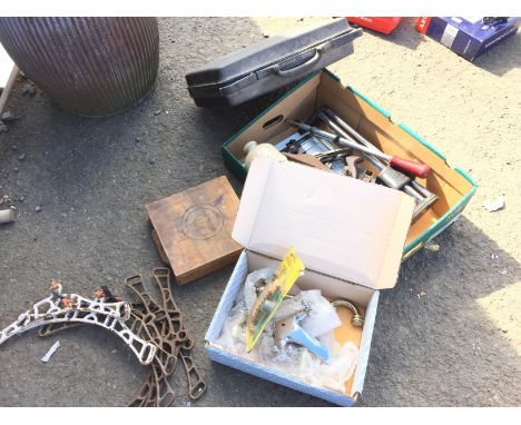 A selection of tools, some hot water pigs, taps, a hot water boiler and some clothes rail ends.