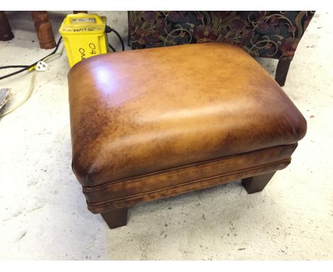 A Laura Ashley leather stool.