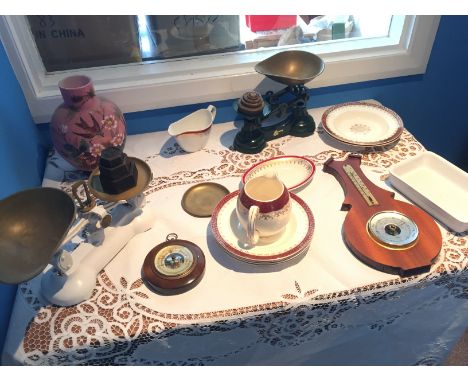 * A selection of items including a barometer.