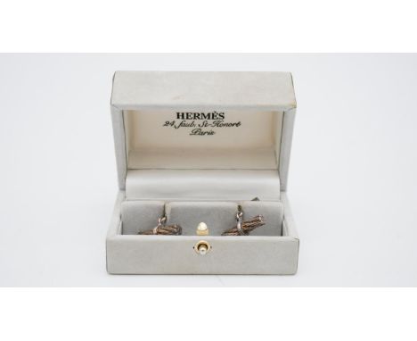 A boxed set of vintage Hermes rope design articulated silver cufflinks. Signed Hermes, Paris. H.4.5 W.8.5 W.5.5cm (box) 