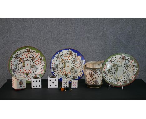 A collection of playing card and dice items. Including dice ashtrays, a large wash jug with playing card design, hardstone di