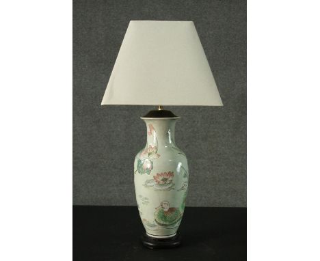 A 20th century Chinese ceramic vase converted to a table lamp. Decorated with mandarin ducks and lotus flowers. H.70cm. 