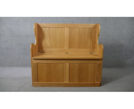 Hall settle, 19th century style light oak. H.98 W.106 D.42cm 