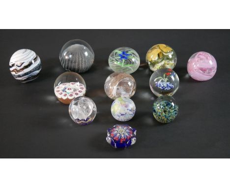A collection of twelve lamp work limited edition paperweights by various makers, including Verrucci, Allum Bay and EM. H.8 W.