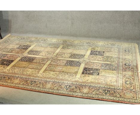 A woollen Bakhtiar style carpet with 'garden' sections decorated with trees. L.300 W.200cm. 