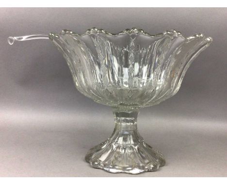 EARLY TO MID-20TH CENTURY PRESSED GLASS PUNCH BOWL,32cm diameter, with ladle, along with a duck form ashtray (2)