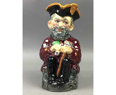 CERAMIC TOBY JUG,19cm high, along with other jugs and four military figures