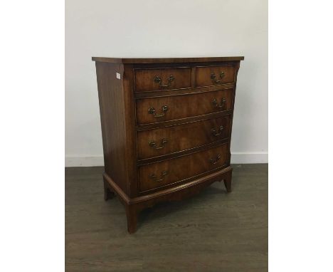 REPRODUCTION MAHOGANY BOW FRONT CHEST OF DRAWERS,with two short drawers over three long drawers, on bracket feet, 84cm high, 