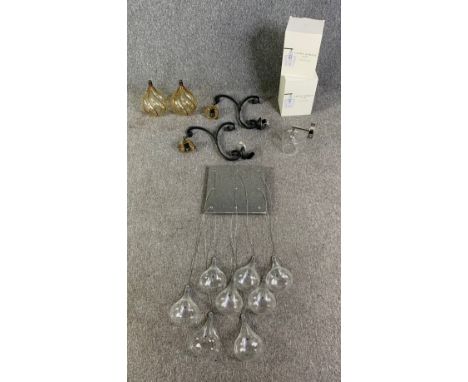 A pair of wall lights, a boxed Laura Ashley wall light and a hanging nine bulb chandelier. H.76cm (largest)