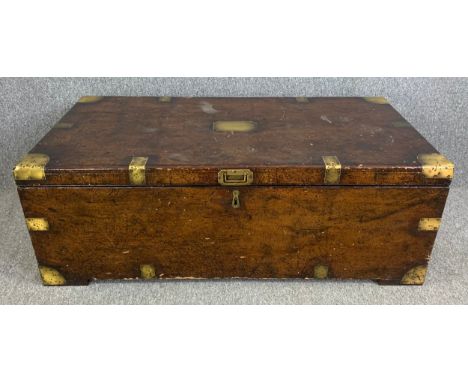 A 19th century military style camphorwood trunk, brass bound with fitted interior. H.40 W.113 D.60cm
