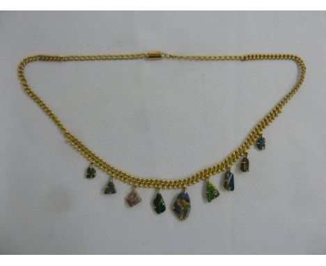 9ct yellow gold necklace with nine fire opal pendants, approx total weight 37.2g