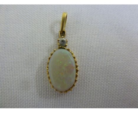 18ct yellow gold, diamond and opal pendant, approx 1.7g total weight