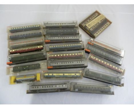A quantity of HO gauge model railway rolling stock and coaches in original packaging to include Fleischmann and Rowa  (19)