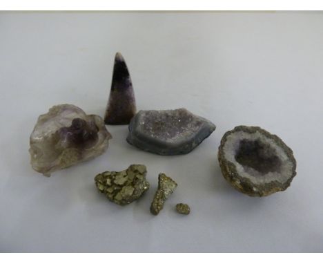 A carved Oriental amethyst and various semi-precious stones
