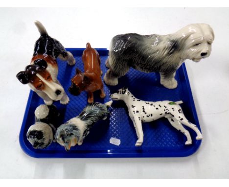 A tray of six ceramic dogs : Beswick Dalmatian, Coopercraft old English sheep dog, Airdale terrier etc 