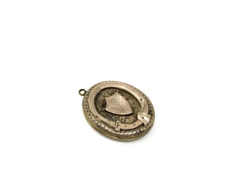 A vintage gold plated pendant   