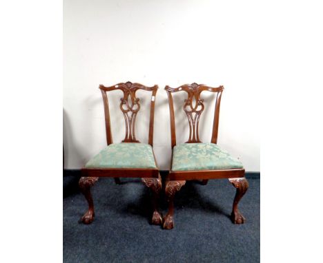 A pair of contemporary Chippendale style dining chairs on claw and ball feet