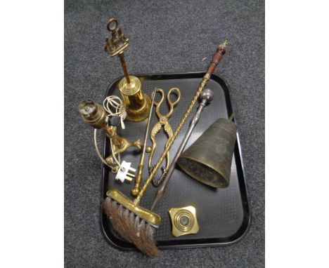 A tray of antique metal wares to include embossed bell, fire companion brush and pieces, Art Nouveau brass table lamp. 