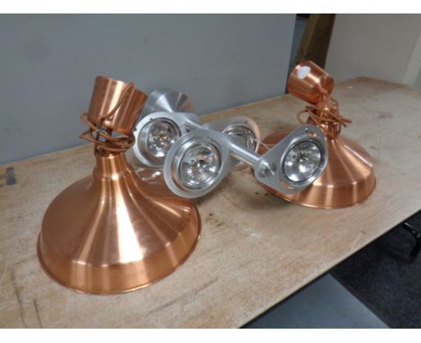 A contemporary brushed steel four way ceiling spotlight together with two copper pendant light fittings  