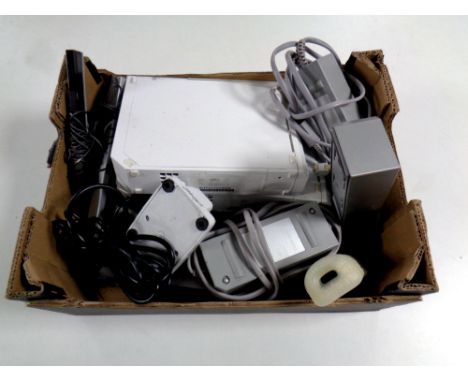 A box of two Nintendo Wii with power packs and leads, third party DSi games console pack 