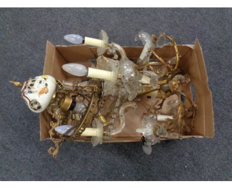 An antique brass six branch chandelier with glass drops, hanging oil lamp (no shade) and a further chandelier 