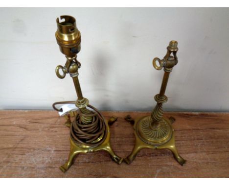 A pair of antique brass lamp bases. 