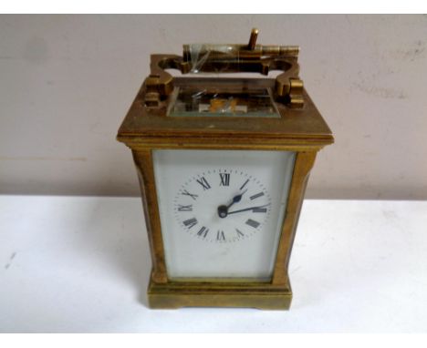 A brass cased carriage clock with key 