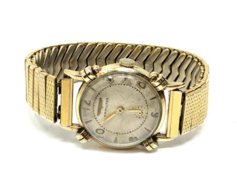 A gent's vintage gold plated wristwatch signed Hamilton, on gilt expanding strap. 