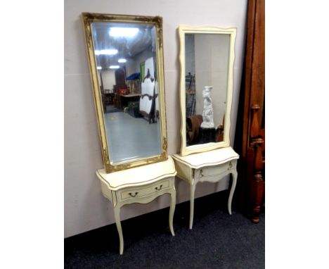 A white and gilt one drawer console table with mirror together with a similar cream and gilt one drawer console table with mi