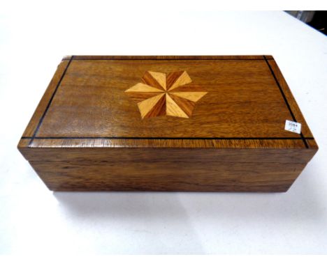 An antique inlaid trinket box with flower embroidery insert  