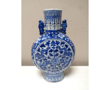 A Chinese glazed blue and white moon flask vase, height 25cm.  CONDITION REPORT: In good condition. 