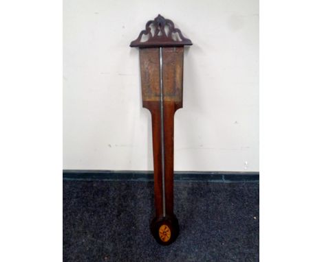 A 19th century stick barometer. 