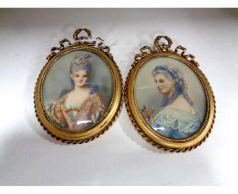 A pair of ornate gilt framed portrait miniatures, hand finished and indistinctly initialled, each 6.5 cm x 8.5 cm. (2)