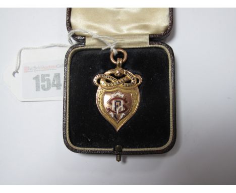 Medal, Staffordshire Football Association Senior Cup Winners 1930 - 1931 in gold and enamel, stamped '9'  '375' and dated for