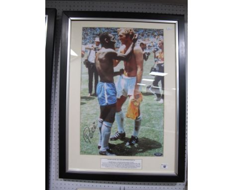 Pele Autograph, black marker signed on a 'Champions' coloured print of him embracing Bobby Moore (unverified) certificate of 