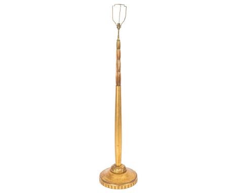 A  20th Century carved gilt wood standard lamp:, the two stage column raised on a floral carved domed base and circular foot,