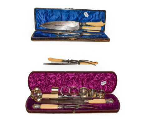 Four silver napkin rings, silver vesta, silver collared carving sets, toddy ladle with whalebone handle, two plated serviette